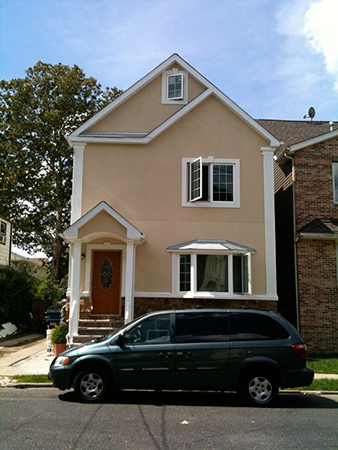 Stucco and White Window Trims Services